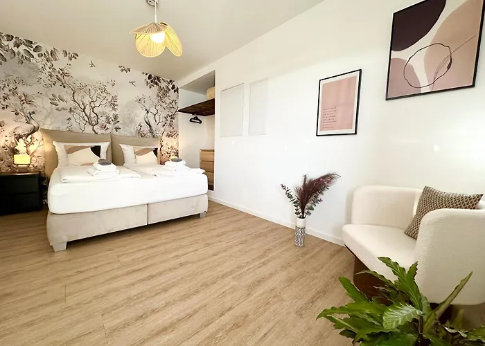 Апартаменты Special - Stadtnah, Balkon, Parkplatz, E-ladestation, Gitterbox Fuer Fahrraeder, Fitnessstudio *